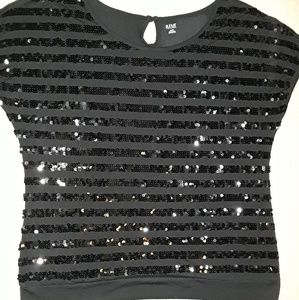 SOLD.        Great glitzy top ...